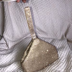 Cute gold with crystals bag!